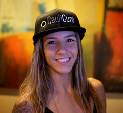 Caulicure Cauliflower ear prevention Flat bill fitted hat with BJJ Black Belt Patti Fontes